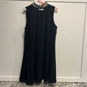 Black cocktail dress, size XL. Gorgeous neckline. Great for holiday parties.